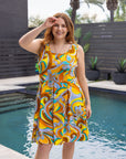 24seven Comfort Apparel Plus Size Yellow Paisley Sleeveless Pleated Knee Length Pocket Dress
