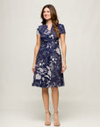 24seven Comfort Apparel Womens Navy Print Short Sleeve Knee Length V Neck Wrap Dress