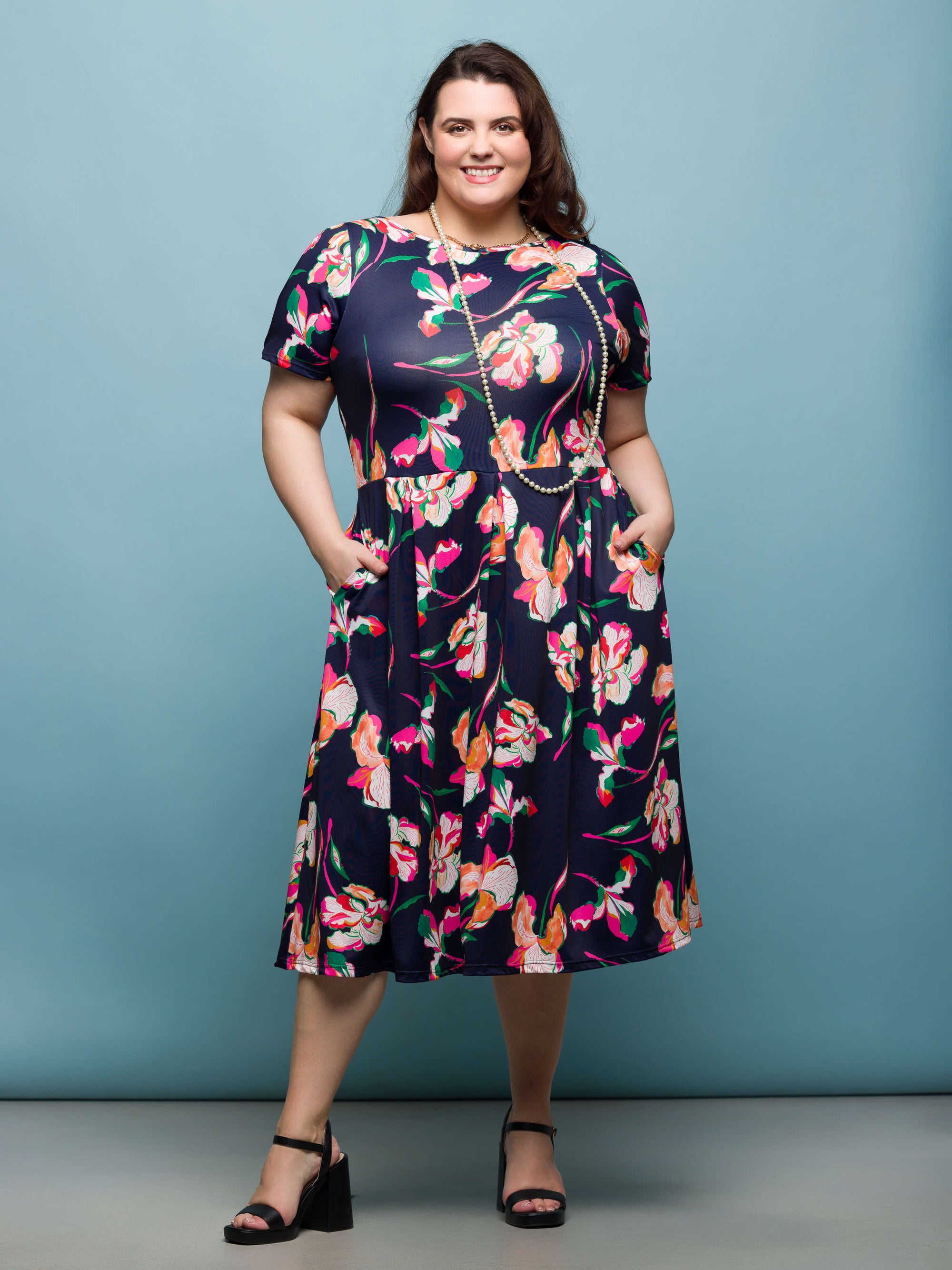 24seven Comfort Apparel Plus Size Navy Floral Short Sleeve Pleated Flare Midi Pocket Dress