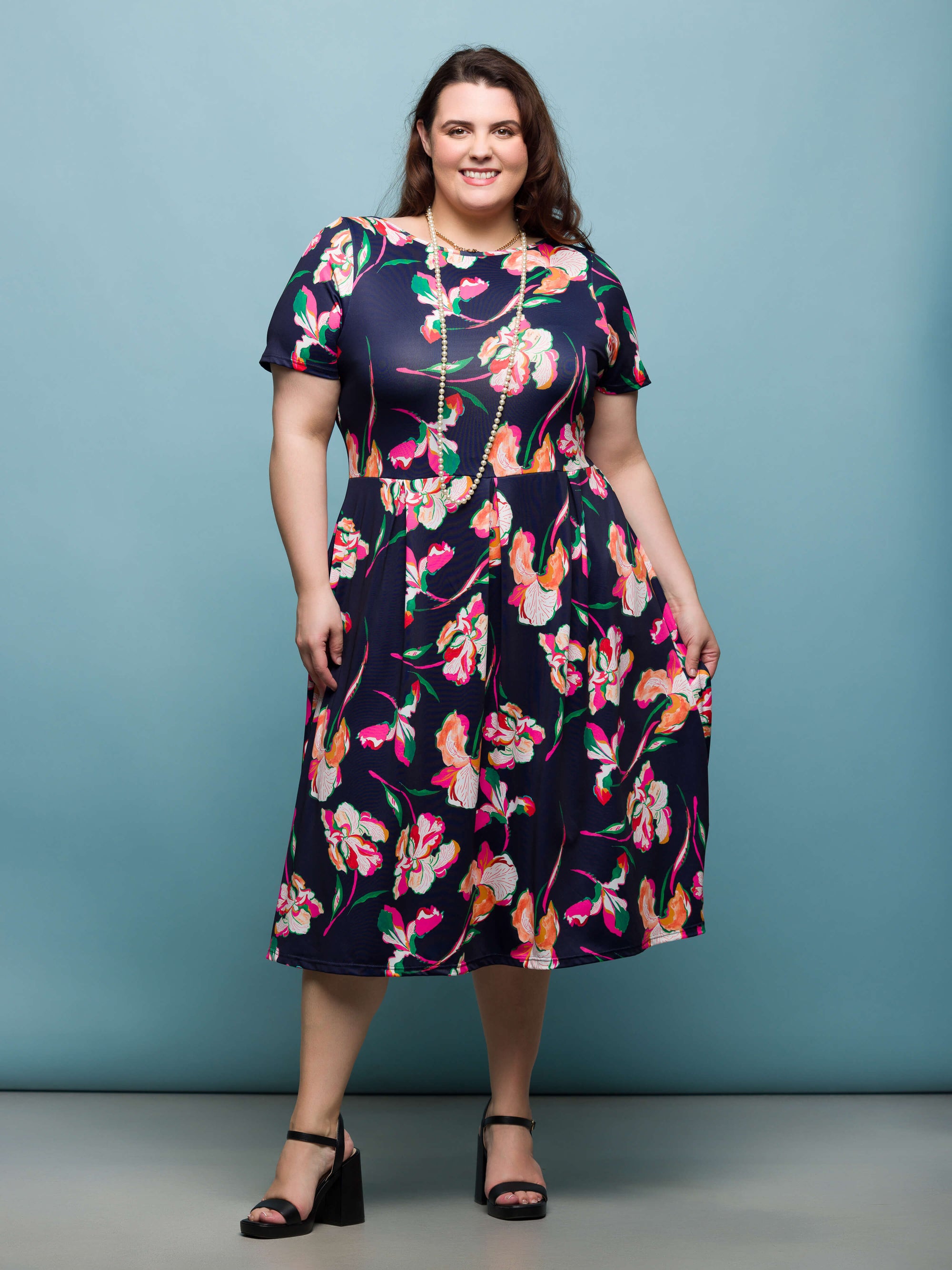 24seven Comfort Apparel Plus Size Navy Floral Short Sleeve Pleated Flare Midi Pocket Dress